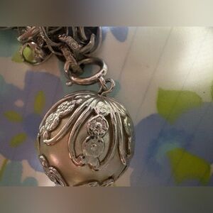 Elegant Silver Cream Ornate Pendant Necklace
